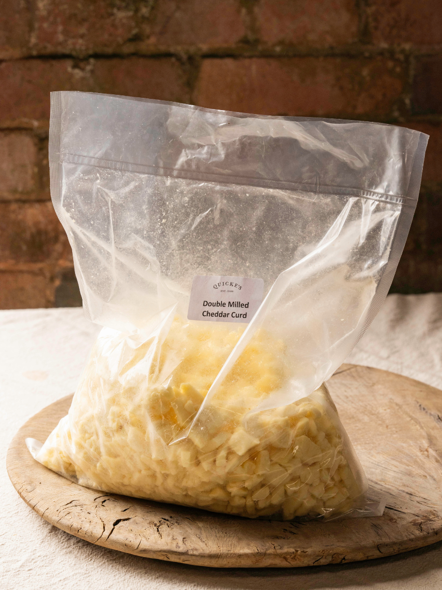 Quicke's Cheddar Curd fromage frais à fondre 600g lait vache